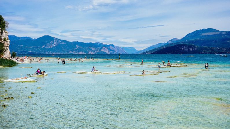 <strong>Sirmione: </strong>This tiny town on the shores of Lake Garda is known for its thermal waters as well as its beautiful beaches, which are filled with rock formations.