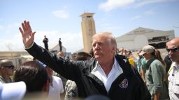 CAROLINA, PUERTO RICO - OCTOBER 03:  President Donald Trump waves as he arrives at the Muniz Air National Guard Base for a visit after Hurricane Maria hit the island on October 3, 2017 in Carolina, Puerto Rico.  