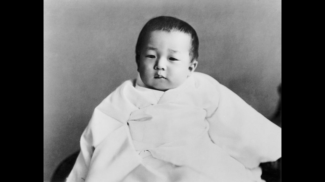 In December 1933, Tsugunomiya Akihito was born to Emperor Hirohito and Empress Nagako. He was their fifth child and first son. According to Japanese legend, he is a direct descendant of Japan's first emperor Jimmu, circa 660 BC. Akihito means "shining pinnacle of virtue," and Tsugunomiya means "prince of the august succession and enlightened benevolence."