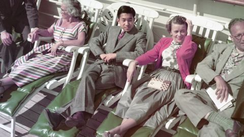 During a seven-month trip in 1953, Akihito sits on the promenade deck of a cruise ship headed from Hawaii to San Francisco. He visited 14 countries.