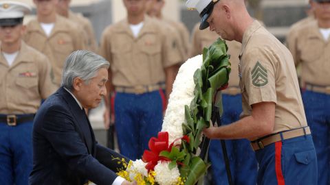 During a visit to Honolulu in 2009, Akihito lays a wreath at the National Memorial Cemetery of the Pacific. Akihito has repeatedly expressed remorse for his country's actions before and during World War II.
