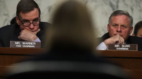 Chairman Sen. Richard Burr, a North Carolina Republican at right, and top Democrat on the panel Sen. Mark Warner of Virginia, at left, listen during a hearing before the Senate Intelligence Committee last June on Capitol Hill. (Photo by Alex Wong/Getty Images)