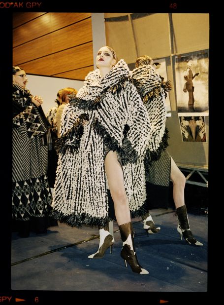 Model Erin O'Connor poses for Fairer backstage during Galliano's Autumn-Winter show in 1999. 