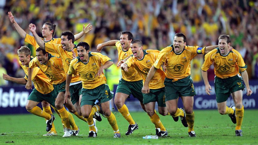 SYDNEY, AUSTRALIA:  The Australian Socceroos jubilate after defeating Uruguay in the FIFA World Cup qualifier at Stadium Australia in Sydney, 16 November 2005. Australia ended their 31-year nightmare to qualify for the 2006 World Cup finals in Germany by winning the penalty shootout 4-2 after both teams remained tied at one home goal each after extra time.  AFP PHOTO/Torsten BLACKWOOD  (Photo credit should read TORSTEN BLACKWOOD/AFP/Getty Images)