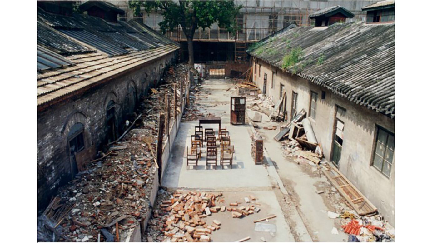 In the 1990s, China's major cities were swept up in vast redevelopment projects and the campus of the Central Academy of Fine Arts could not escape relocation despite student and teacher protests. One of the faculty was artist Sui Jianguo, who continued to teach despite the destruction of his classroom. "The artist's comment on what's going on in the immediate city is particular to contemporary art," says Wu Hung. "When the whole area was destroyed, the work was destroyed as well." <em>Sui Jianguo "Ruins" part of the project "Property Development" by the Three Men United Studio (1994) site-specific installation on the former caps of the Central Academy of Fine Arts, Beijing. </em>
