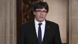 Catalan President Carles Puigdemont speaks during a statement at the Palau Generalitat in Barcelona, Spain, on Wednesday, Oct. 4, 2017. Catalonia's regional president, Carles Puigdemont, is addressing regional lawmakers on Monday to review a referendum won by supporters of independence from Spain on Oct. 1. (Jordi Bedmar/Presidency Press Service, Pool Photo via AP)