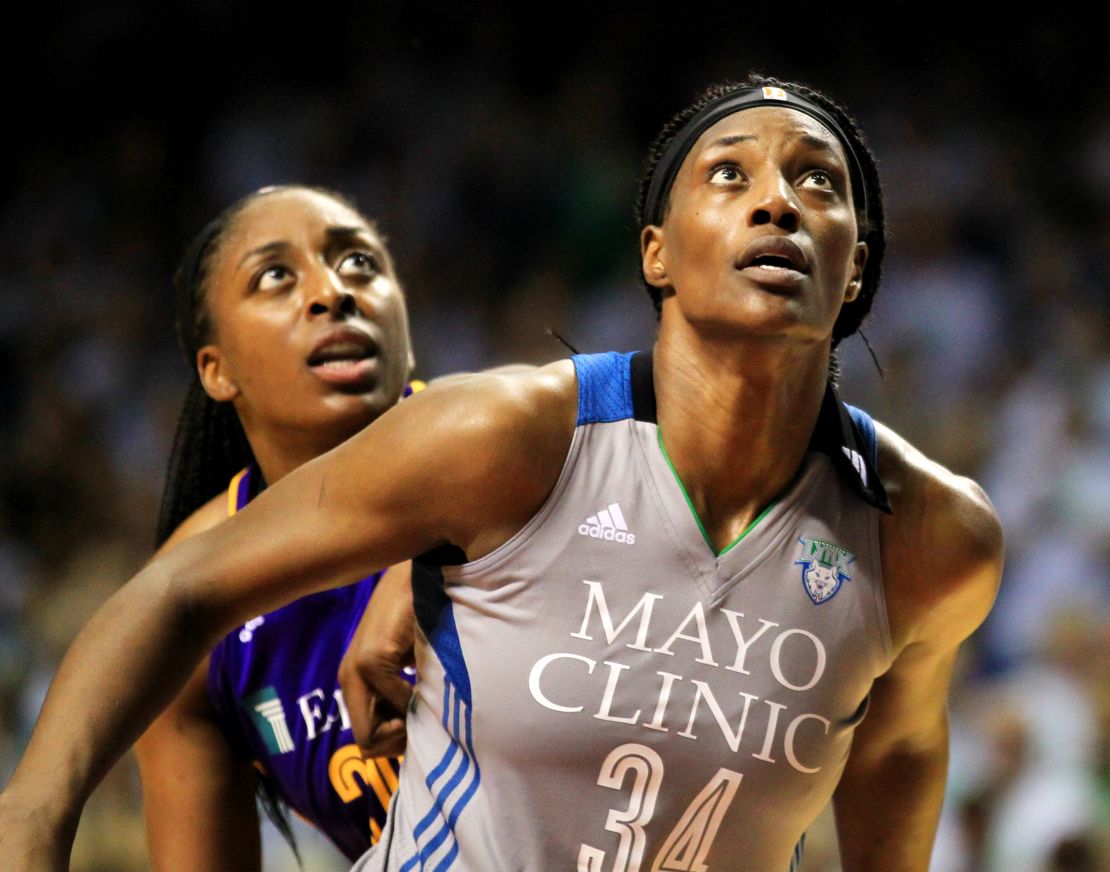 Sylvia Fowles #34 of the Minnesota Lynx and Nneka Ogwumike #30 of the Los Angeles Sparks battle for position in Game 1.