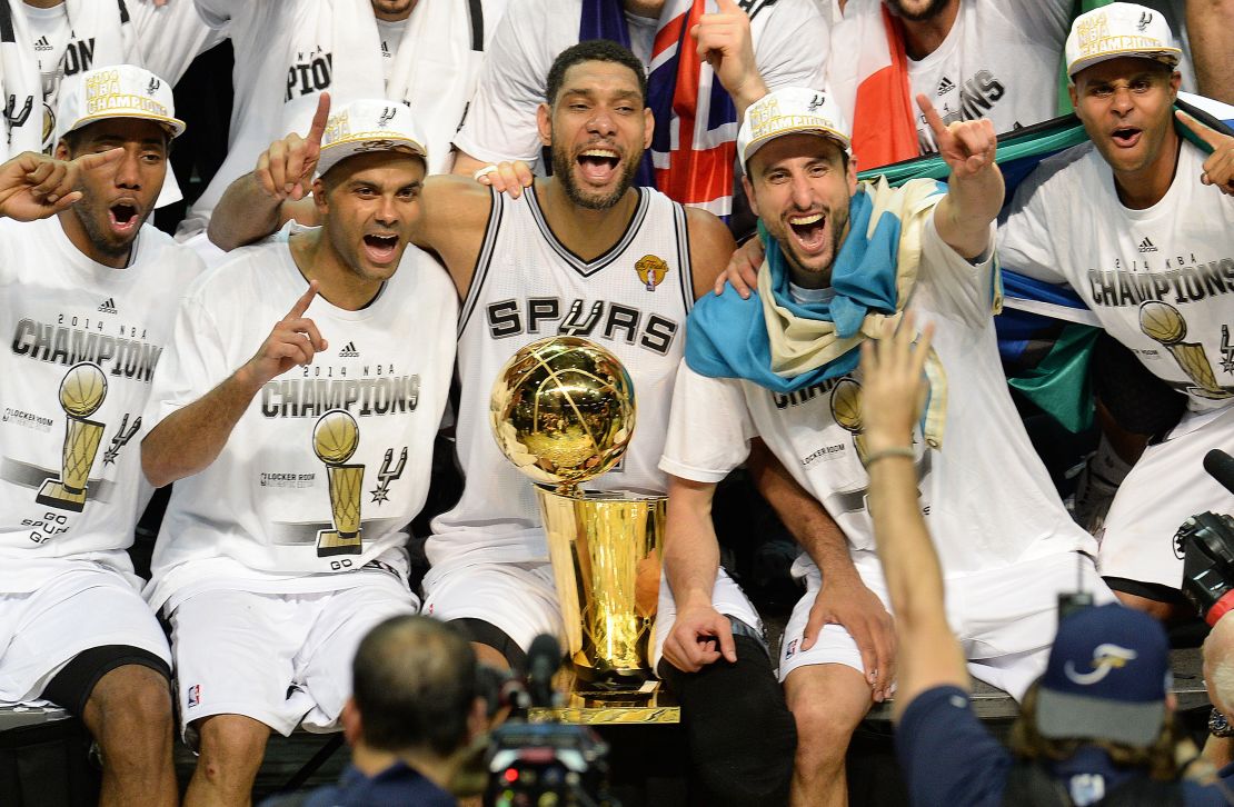 The San Antonio Spurs celebrate with the Larry O'Brien NBA Championship Trophy after defeating the Miami Heat 107-84 in Game 5 of the NBA Finals to win the NBA Finals Championship 2014.