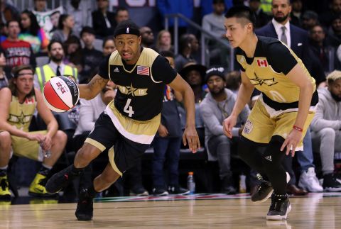Terrence Jenkins of Team USA and Kris Wu of Team Canada during the 2016 NBA All-Star Celebrity Game in Toronto.