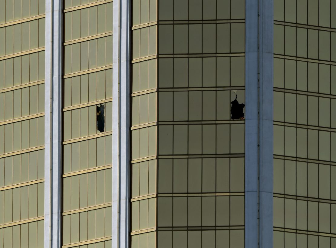 The damaged windows on the 32nd floor room that was used by the shooter in the Mandalay Hotel 