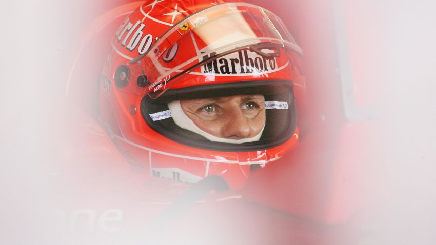 Suzuka, JAPAN:  Seven times world champion Michael Schumacher of Germany in his Ferrari gazes at a TV monitor during a free practice session of the Formula One Japanese Grand Prix in Suzuka Circuit in Suzuka, central Japan, 06 October 2006.       AFP PHOTO/Toru YAMANAKA  (Photo credit should read TORU YAMANAKA/AFP/Getty Images)