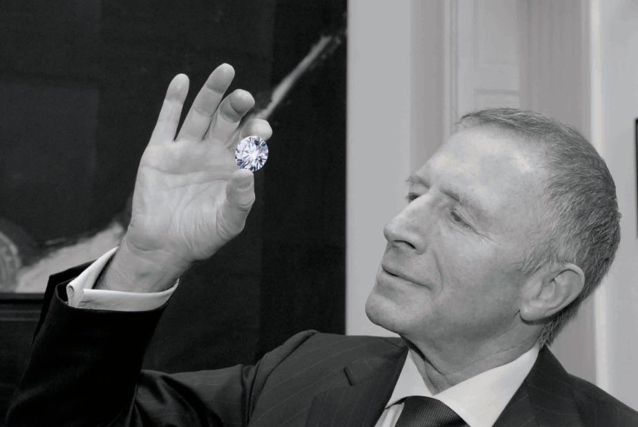 Graff chairman Laurence Graff with the 102.79-carat Constellation, the world's largest D-colour, internally flawless round diamond, which was cut from Graff's Light of Letšeng 478-carat rough.