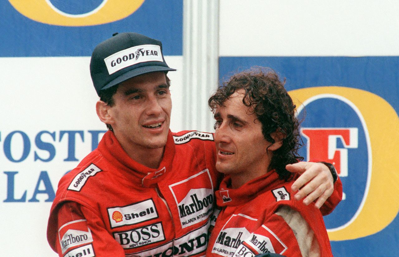 McLaren teammates Ayrton Senna (left) and Alain Prost embrace after the Brazilian clinched the 1988 title in Australia. Their friendship on and off the track didn't last long. 