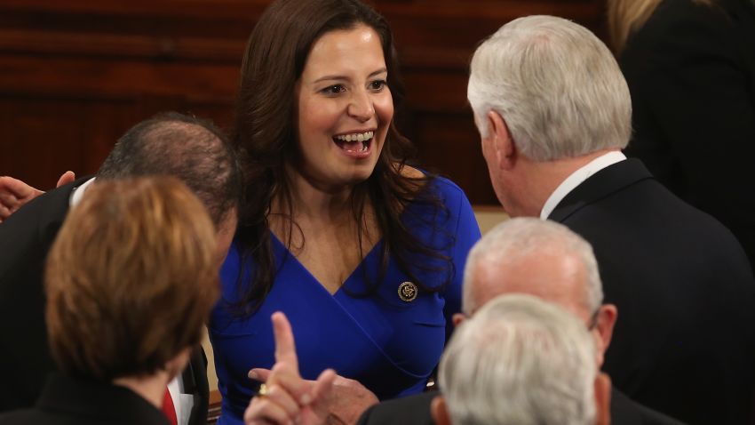 Rep. Elise Stefanik (R-NY) (C) talks with other members during the first session of the 114th Congress in the House Chambers January 6, 2015 in Washington, DC.