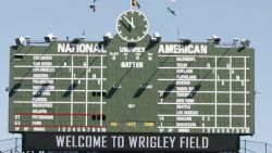 Offseason trivia. Based on the out of town scoreboard at wrigley, what year  was this picture taken? : r/baseball