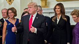 WASHINGTON, DC - OCTOBER 5:  U.S. President Donald Trump and first lady Melania Trump pose for pictures with senior military leaders and spouses after a briefing in the State Dining Room of the White House October 5, 2017 in Washington, D.C. 