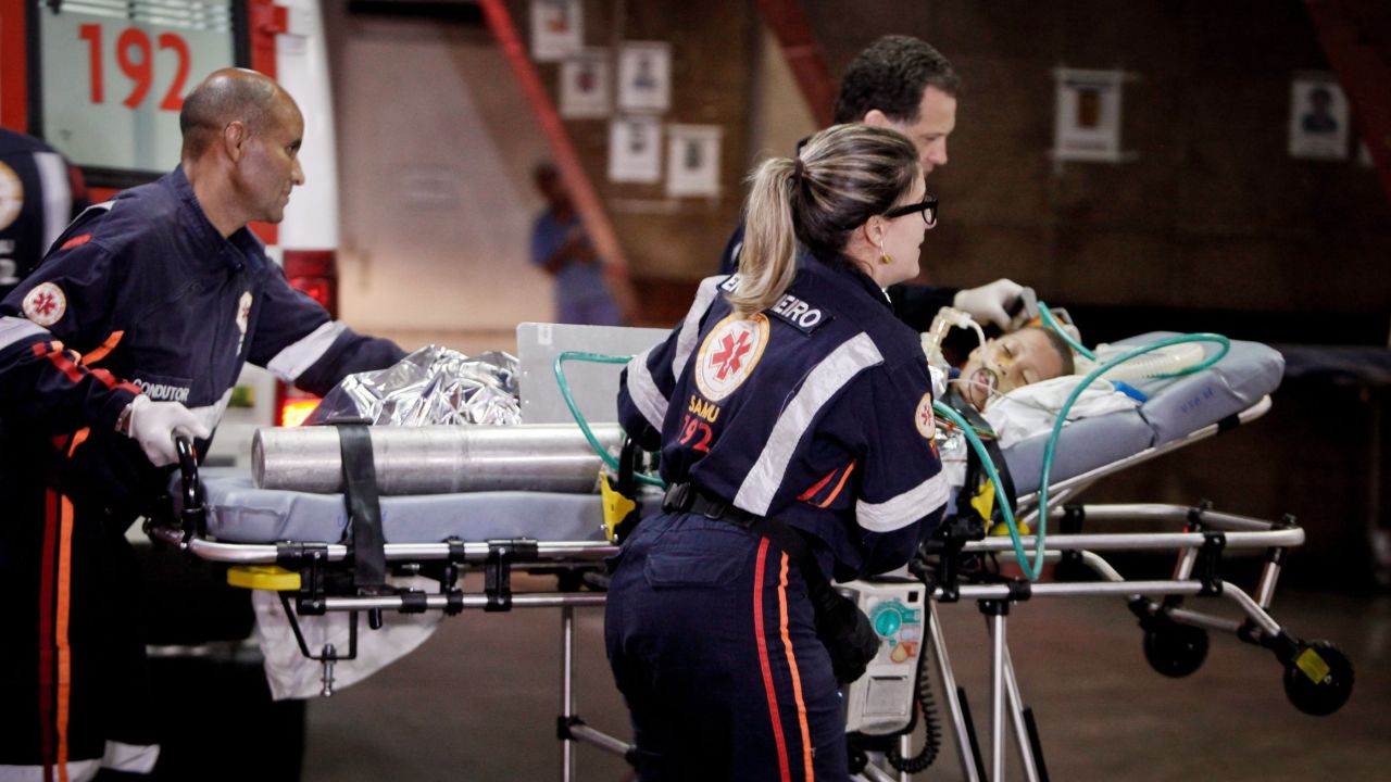 A victim of the fire at a Brazilian daycare centre is admitted to hospital in Belo Horizonte on October 5.