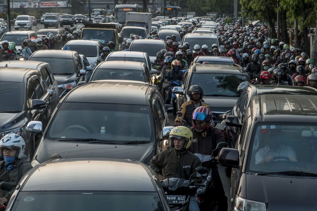 Commuters wait in a traffic jam during afternoon rush hour in Jakarta last month. 