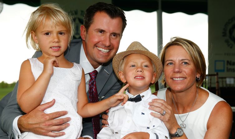Sorenstam poses with her son William, daughter Ava, and husband Mike McGee. Ava was born in 2009 and William two years later.