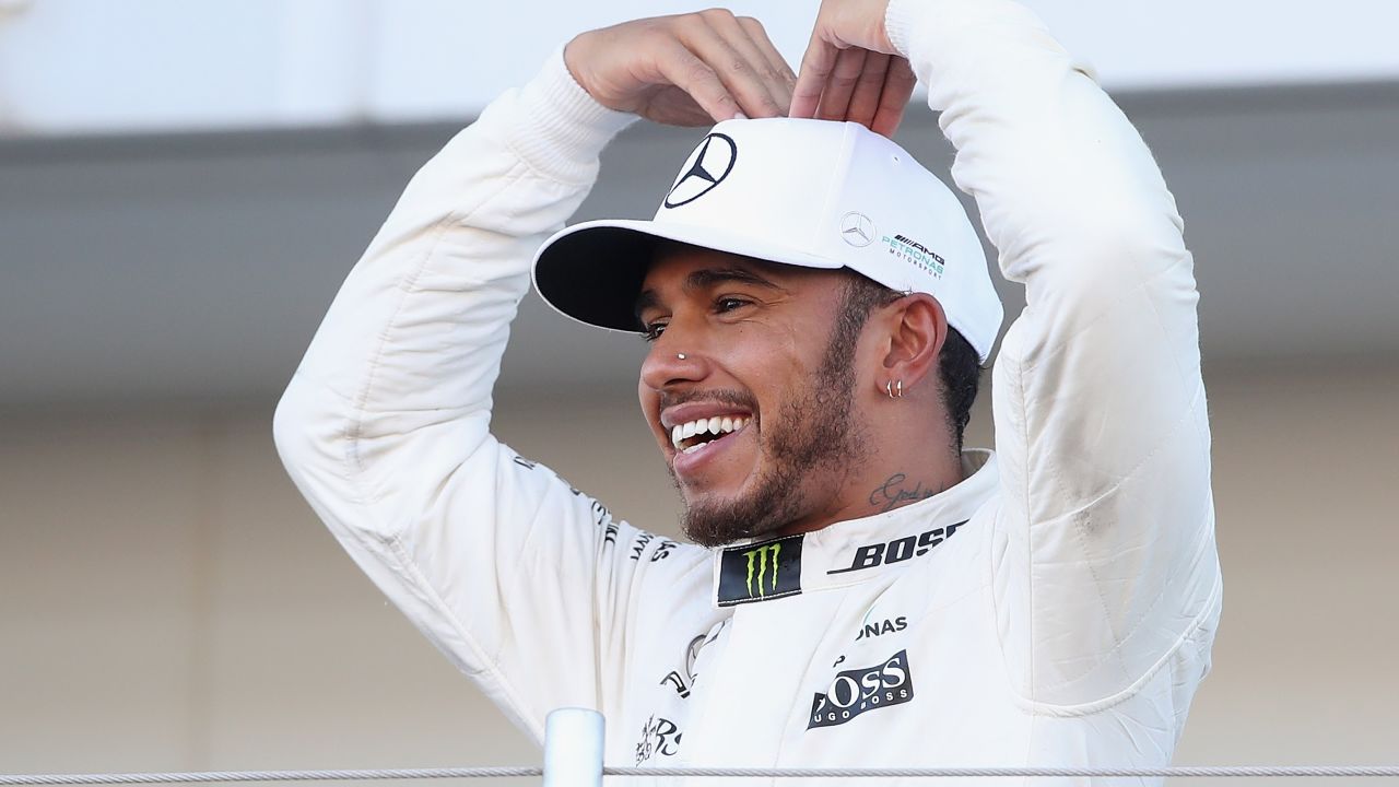 Track and field legend Mo Farah was in the Mercedes garage to watch Hamilton's win so the F1 driving ace showed off his version of the 'Mobot'
