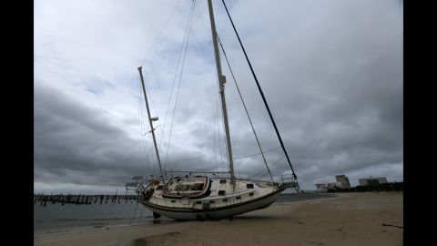 A sailboat is seen after it was washed ashore in Biloxi, Mississippi, during Hurricane Nate on Sunday, October 8, 2017.