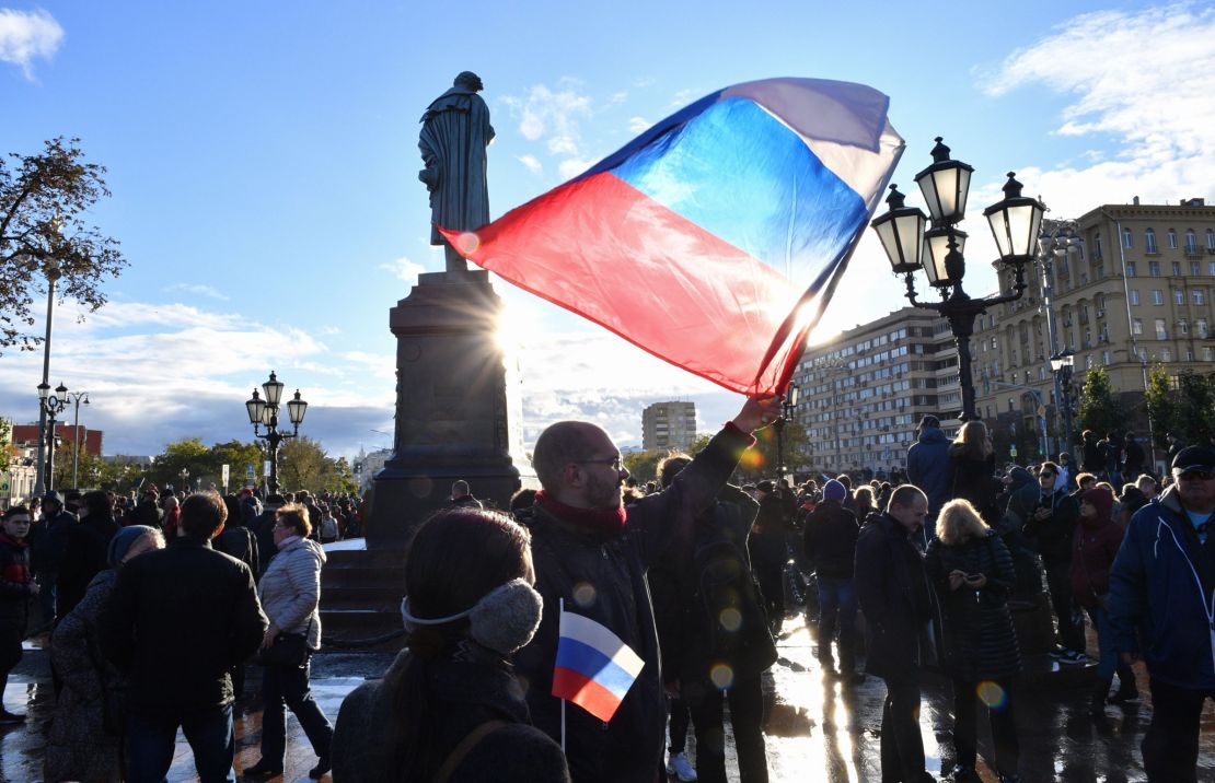 Demonstrators gather by a statue of poet Alexander Pushkin in an anti-Putin rally in Moscow on Saturday.