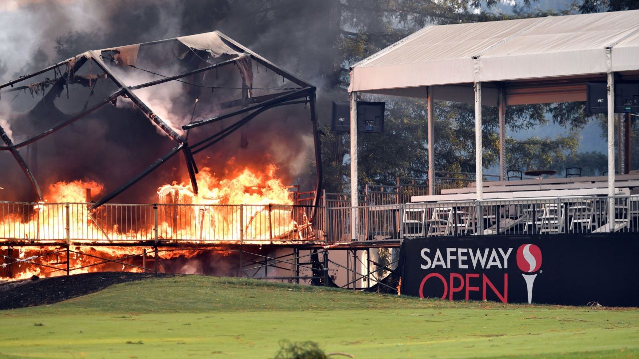 A tent structure built for the Safeway Open golf tournament burns in Napa on October 9.
