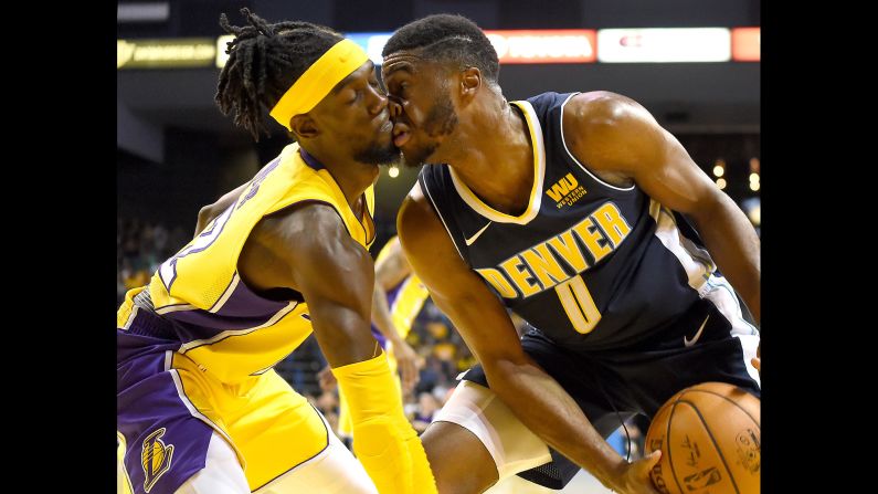 Los Angeles Lakers guard Briante Weber, left, collides with Denver Nuggets guard Emmanuel Mudiay during the second half of the game on Wednesday, October 4.