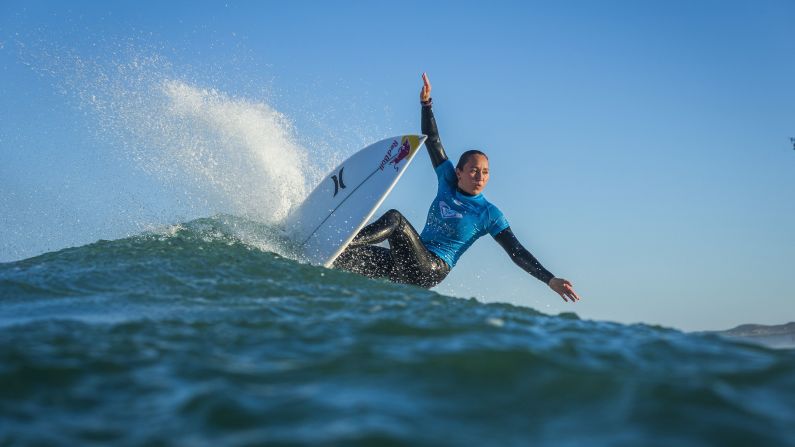 Surfer Carissa Moore rides a wave at the Roxy Pro France tournament on Sunday, October 8. Moore placed second in the first heat of Round 3 and advanced to the semifinals.