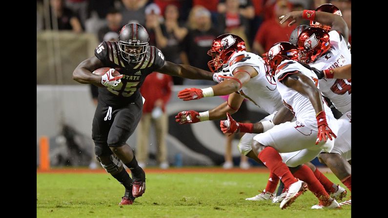 Reggie Gallaspy II, #25, of the North Carolina State Wolfpack runs against the Louisville Cardinals on Thursday, October 5, in Raleigh, North Carolina. North Carolina State won 39-25.