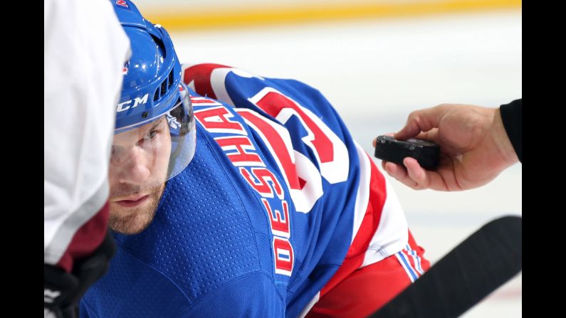 Center David Desharnais of the New York Rangers keeps an eye on the puck during a faceoff in the third period against the Colorado Avalanche at Madison Square Garden on Thursday, October 5.