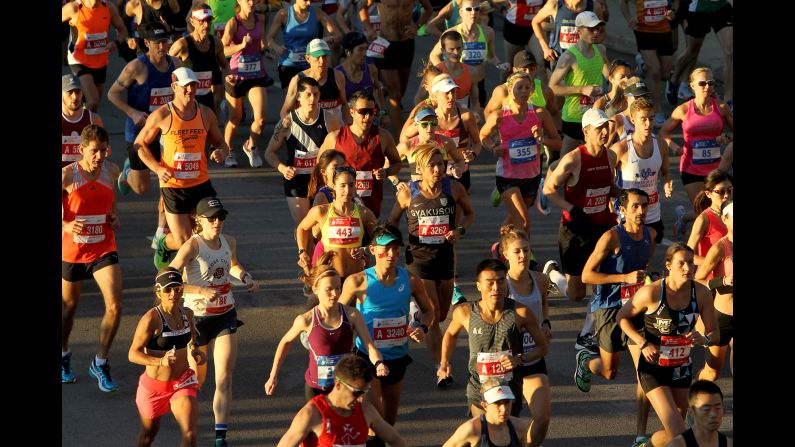 Runners participate during the Chicago Marathon on Sunday, October 8. Crossing the finish line at 2 hours 9 minutes and 20 seconds, Galen Rupp became the first American since 2002 to win the race. Ethiopian Tirunesh Dibaba won the women's race in 2 hours 18 minutes and 31 seconds.