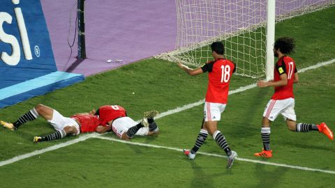 Egypt's players celebrate wining against their World Cup qualifying match against Democratic Republic of Congo.