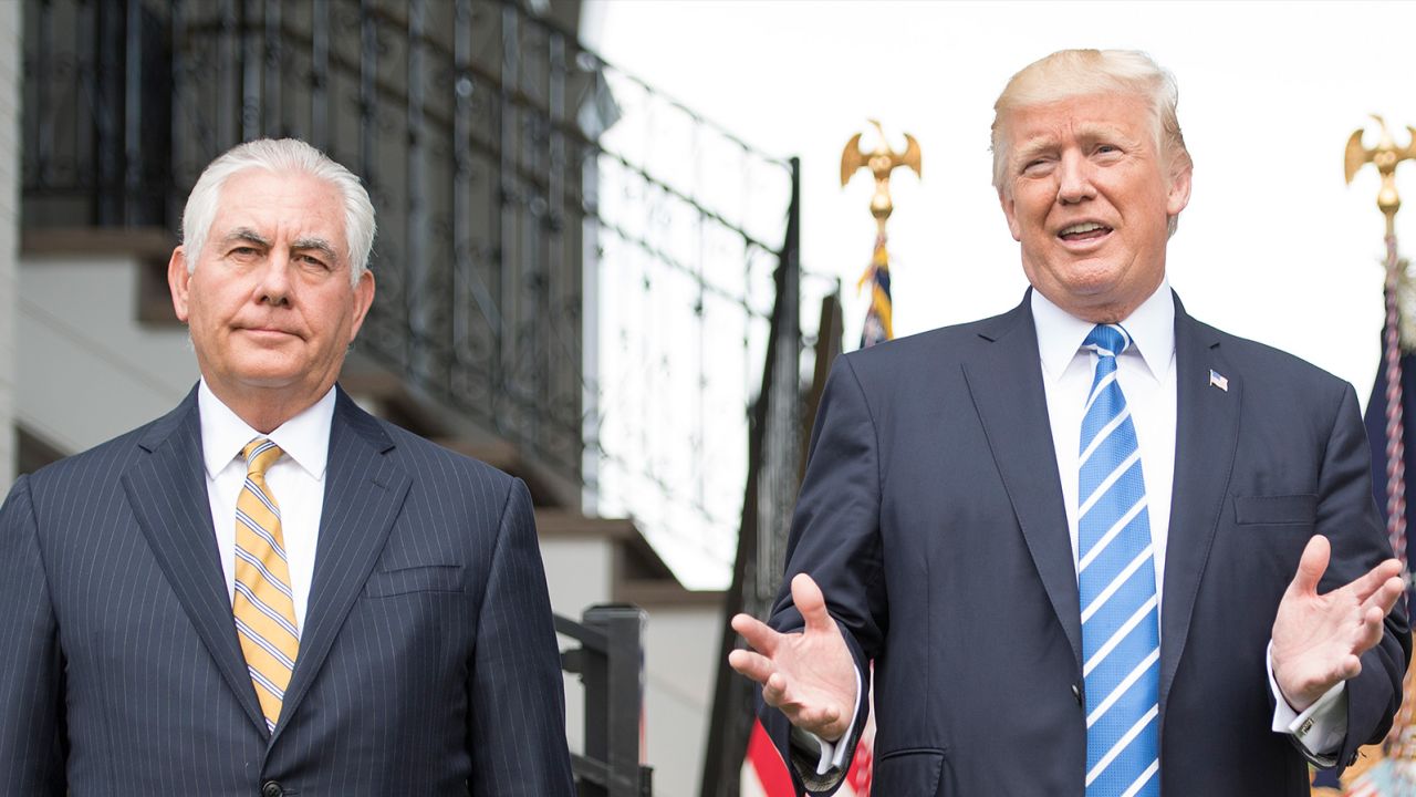 US President Donald Trump (R) speaks to the press with US Secretary of State Rex Tillerson (L) on August 11, 2017, at Trump National Golf Club in Bedminster, New Jersey.