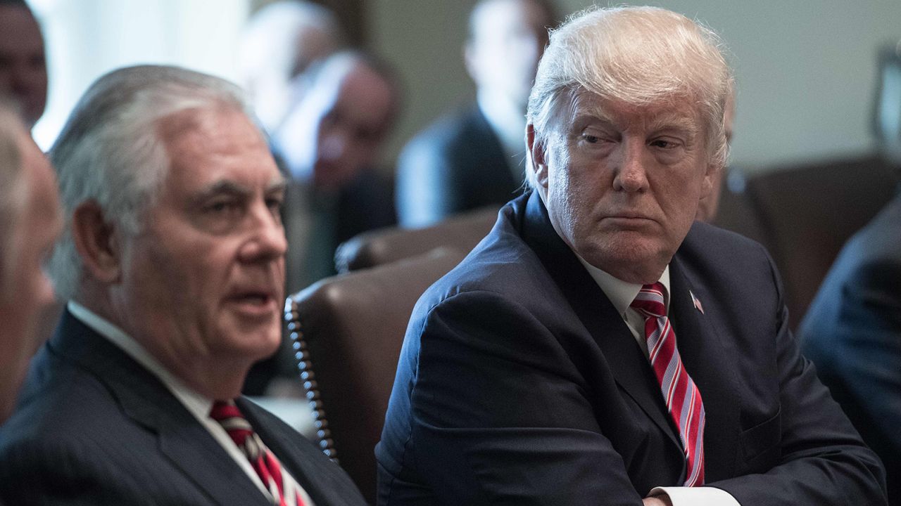 US President Donald Trump listens to Secretary of State Rex Tillerson speak during a cabinet meeting at the White House in Washington, DC, on June 12, 2017.