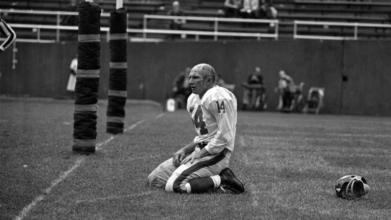 Hall of Fame football quarterback <a href="index.php?page=&url=http%3A%2F%2Fbleacherreport.com%2Farticles%2F2737727-pro-football-hall-of-fame-qb-ya-tittle-dies-at-age-90" target="_blank" target="_blank">Y.A. Tittle </a>died October 8 at the age of 90. Tittle made the Pro Bowl seven times over his 17-year career, and he was the NFL's MVP in 1963. In this photo, Tittle squats on the field after being hit hard during a game against the Pittsburgh Steelers in 1964. This became an iconic photograph that helped cement Tittle's name in football history.