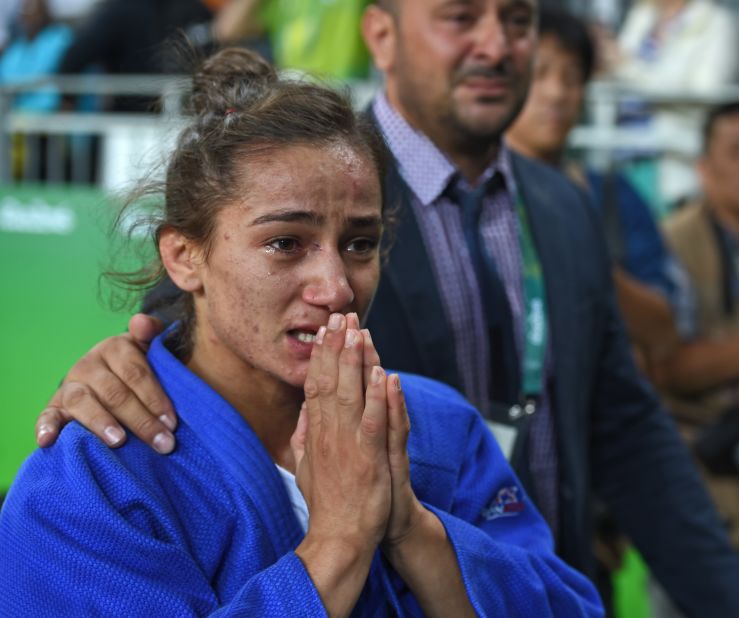Maljinda Kelmendi has been one of the most dominant judokas on the planet over the last four years," says Willingham. "This is partly thanks to the efforts of the International Judo Federation and its president Marius Vizer, who recognized Kosovo as a nation on the judo circuit. The International Olympic Committee accepted Kosovo into the Games in time for Rio 2016, allowing her to become the first ever Olympic gold medalist from that country. This shot is her leaving the tatami after the Olympic final, completely overcome with emotion, her coach Driton Kuka in the background, also with tears in his eyes."