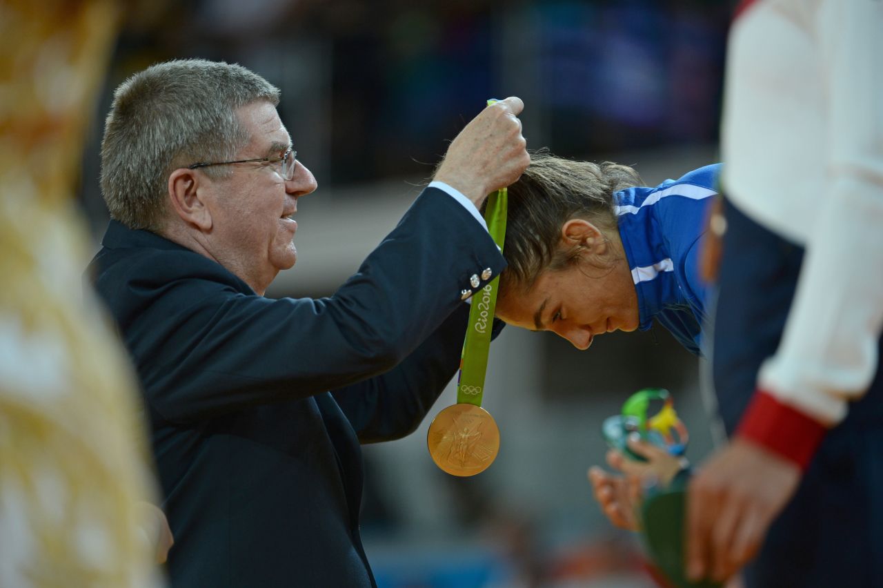 "The second shot I am proud of as it's IOC president Thomas Bach awarding Kelmendi her medal. Once again it's historic, but I also took a risk and snuck around to the side to see both of their faces and managed to find a gap between two of the medal hostesses to get the exact shot I wanted. This also meant I'm sure I'm the only person in the world with this image!"
