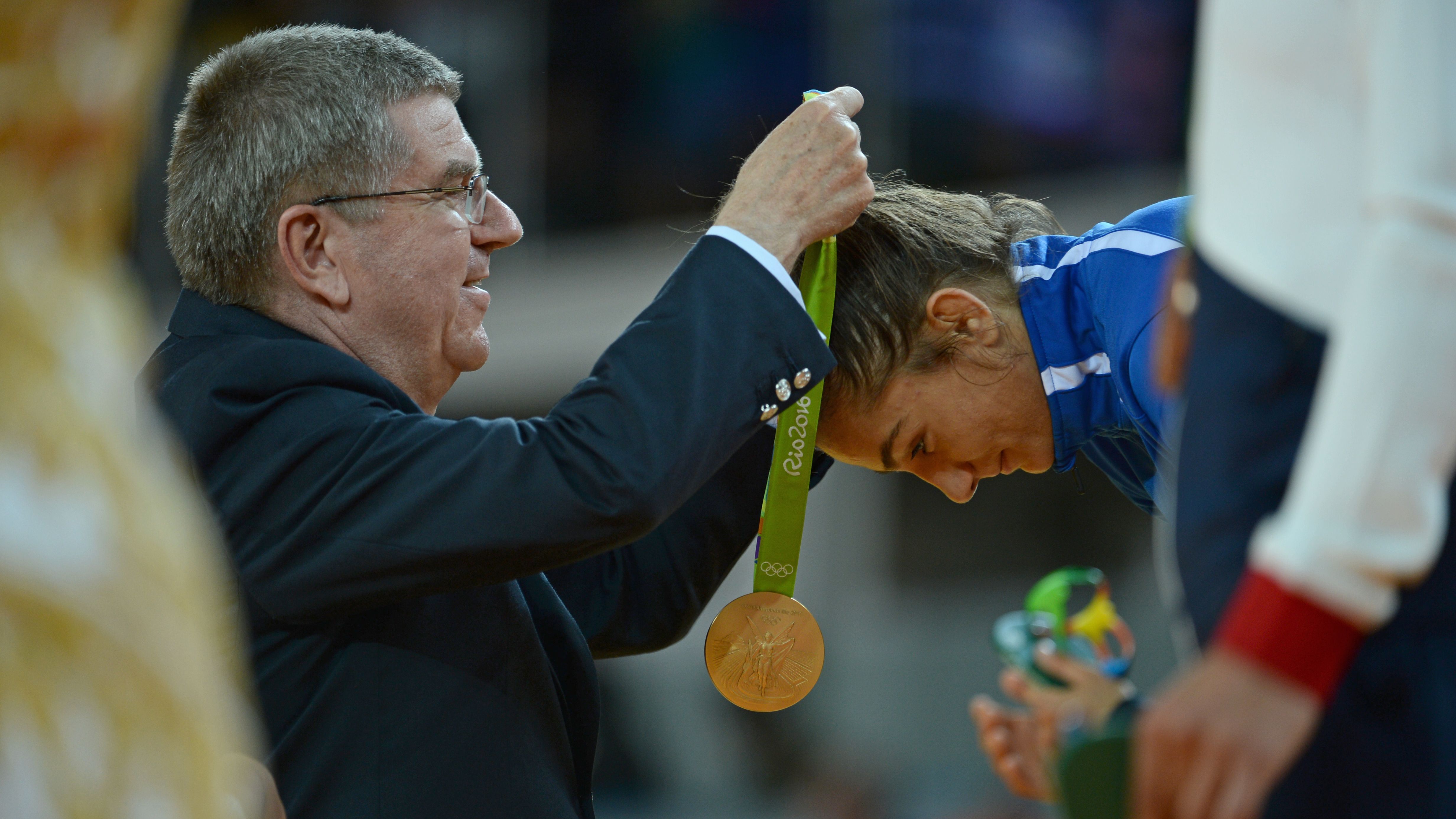 The precise moment Kelmendi was awarded Kosovo's first ever Olympic medal.
