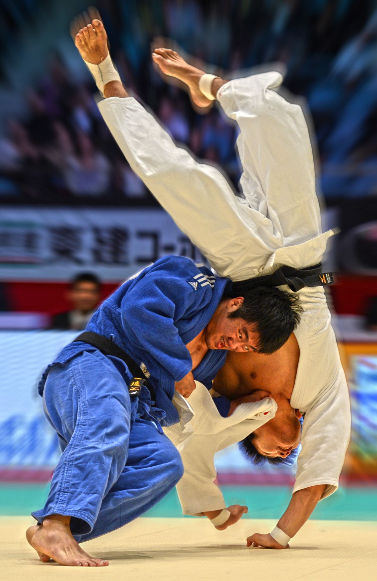 "This throw from the -90kg final of the 2012 Tokyo Grand Slam final by former world champion Lee Kyu Won against Masashi Nishiyama to me really shows how much drive with the legs Lee needs to finish the throw off. I love the expression on his face, I love the flailing arms of Nishiyama trying to scramble to avoid the inevitable, there's so much in this one. It is one my favorites on image alone but, for me, it holds a special place in my heart because 2012 was the first time I had ever been to Japan, the home of judo, and it was my first visit to the legendary Tokyo Grand Slam. So to come away with such a great shot made it all the more special."