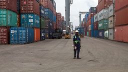 A member of the security stands among containers at the Lagos Tin-Can Island container terminal in Apapa, on October 7, 2015. Tin Can Island Port is Nigerias second largest seaport about seven kilometers due west of the city centre of Lagos across Lagos harbor. AFP PHOTO/FLORIAN PLAUCHEUR        (Photo credit should read FLORIAN PLAUCHEUR/AFP/Getty Images)