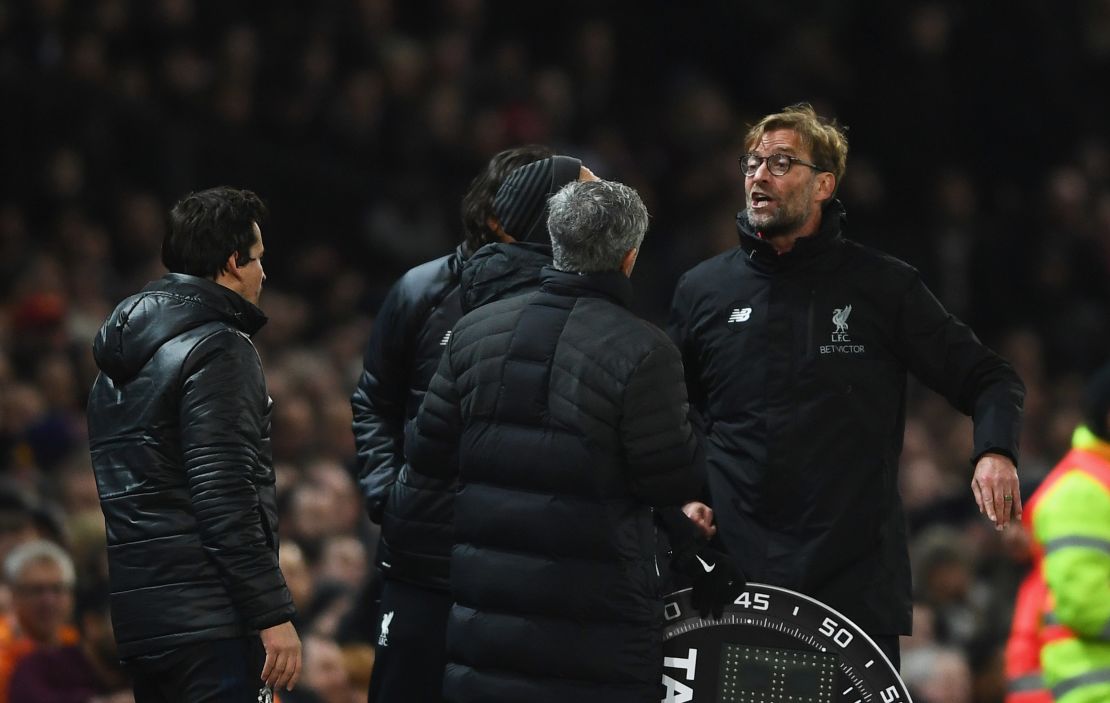 Mourinho and Klopp argue on the touchline during a Premier League match between their sides in January 