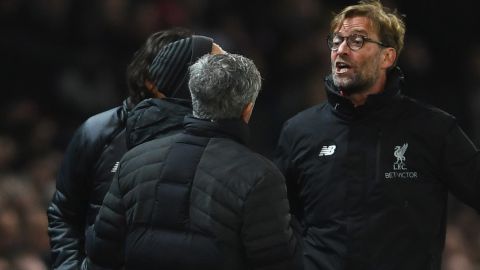 Mourinho and Liverpool boss Jurgen Klopp argue on the touchline during a Premier League match between their sides in January.