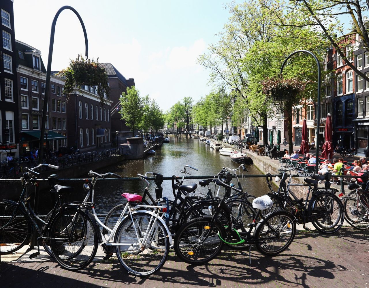 The famous canal of Amsterdam is a must-see. Cycle down the canal and check out the 800-year-old Oude Kerk "Old Church," the Dutch capital's oldest building and oldest parish church, built 1213.