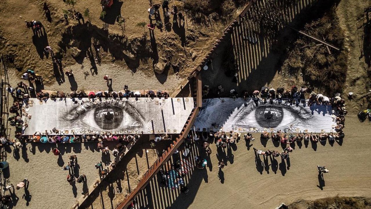 Instagram user @JR posted this ariel view of the "Giant Picnic" at the border.