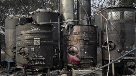 Damaged winemaking vats and tanks stand in ashes and debris at the Paradise Ridge Winery in Santa Rosa.