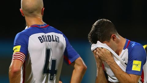 Michael Bradley and Christian Pulisic of the USMNT react to the loss.