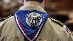 A Boy Scout wears an Eagle Scot neckerchief during the annual Boy Scouts Parade and Report to State in the House Chambers at the Texas State Capitol, Saturday, Feb. 2, 2013, in Austin, Texas. Perry says he hopes the Boy Scouts of America doesn't move soften its mandatory no-gays membership policy.