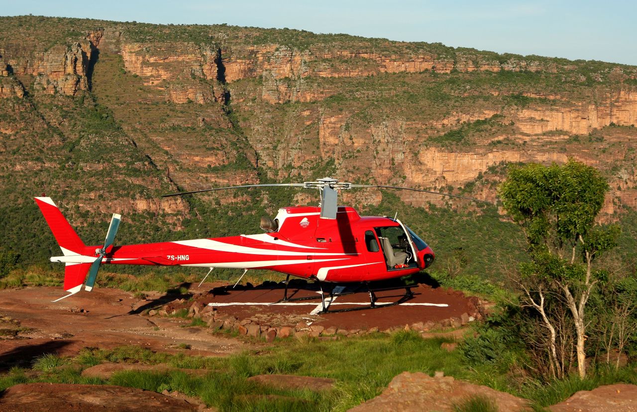 To play the 19th hole at Legends Golf Resort in South Africa, you have to take a helicopter to the tee, which is perched on top of a mountain. 