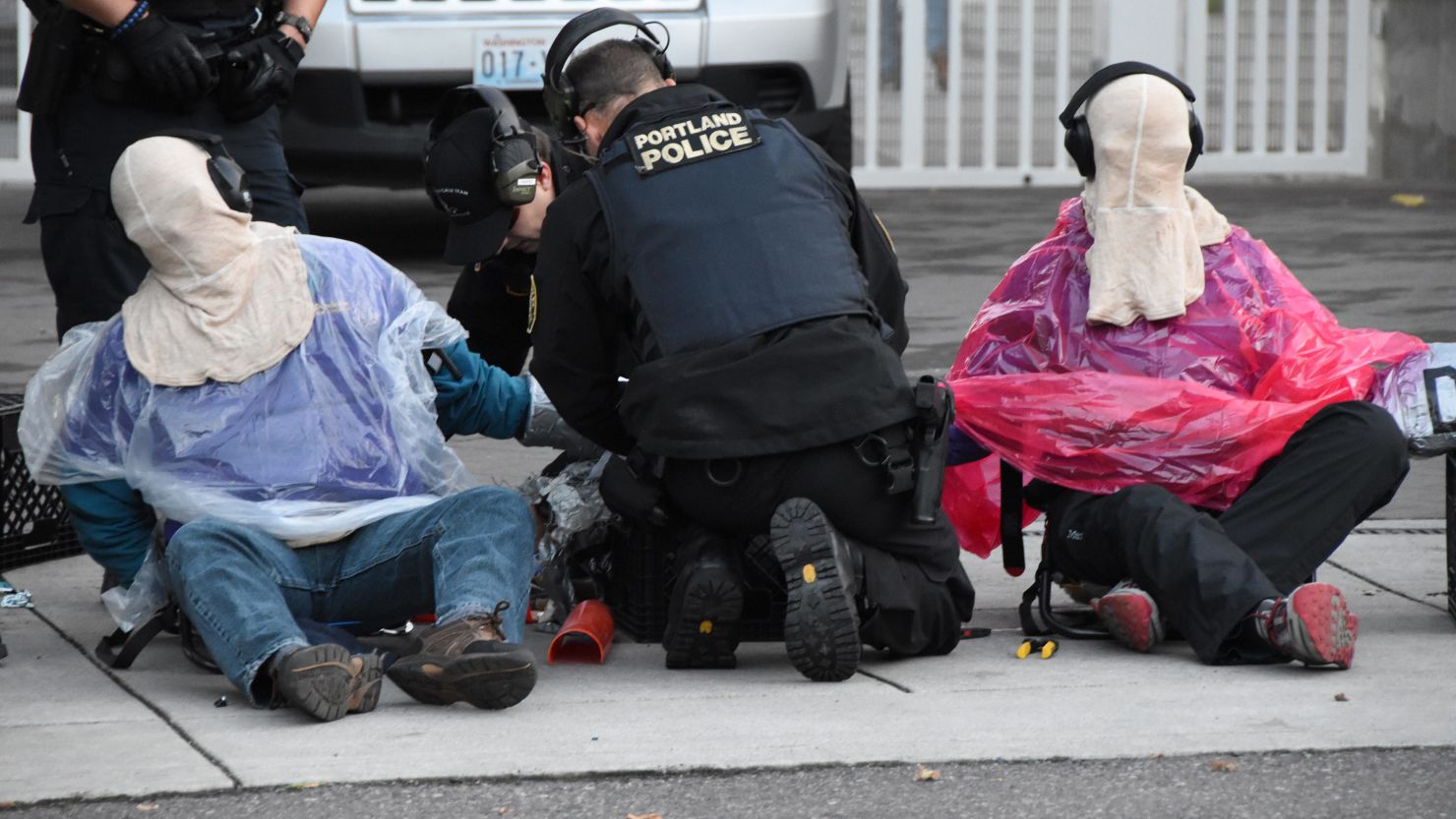 There are two sides to the story behind a strange protest photo CNN